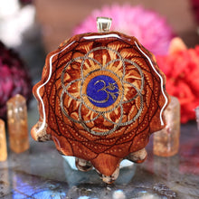 Load image into Gallery viewer, Crushed Lapis (Glows) with Gold Seed of Life and Front Om