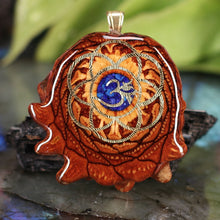 Load image into Gallery viewer, Crushed Lapis (Glows) with Gold Seed of Life and Front Om
