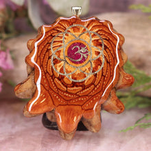 Load image into Gallery viewer, Crushed Sugilite (Glows) with Gold Seed of Life and Front Om