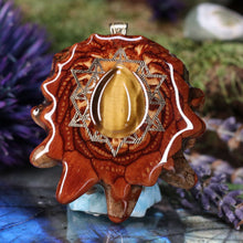 Load image into Gallery viewer, Yellow Tiger's Eye with 64 Star Tetrahedron
