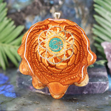 Load image into Gallery viewer, Crushed Malachite (Glows) with Gold Seed of Life and Front Om
