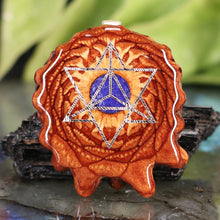 Load image into Gallery viewer, Crushed Lapis (Glows) with Merkaba
