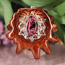 Load image into Gallery viewer, Eudialyte with 64 Star Tetrahedron
