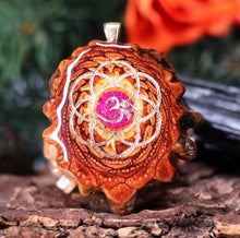 Load image into Gallery viewer, Crushed Sugilite (Glows) with Gold Seed of Life and Front Om
